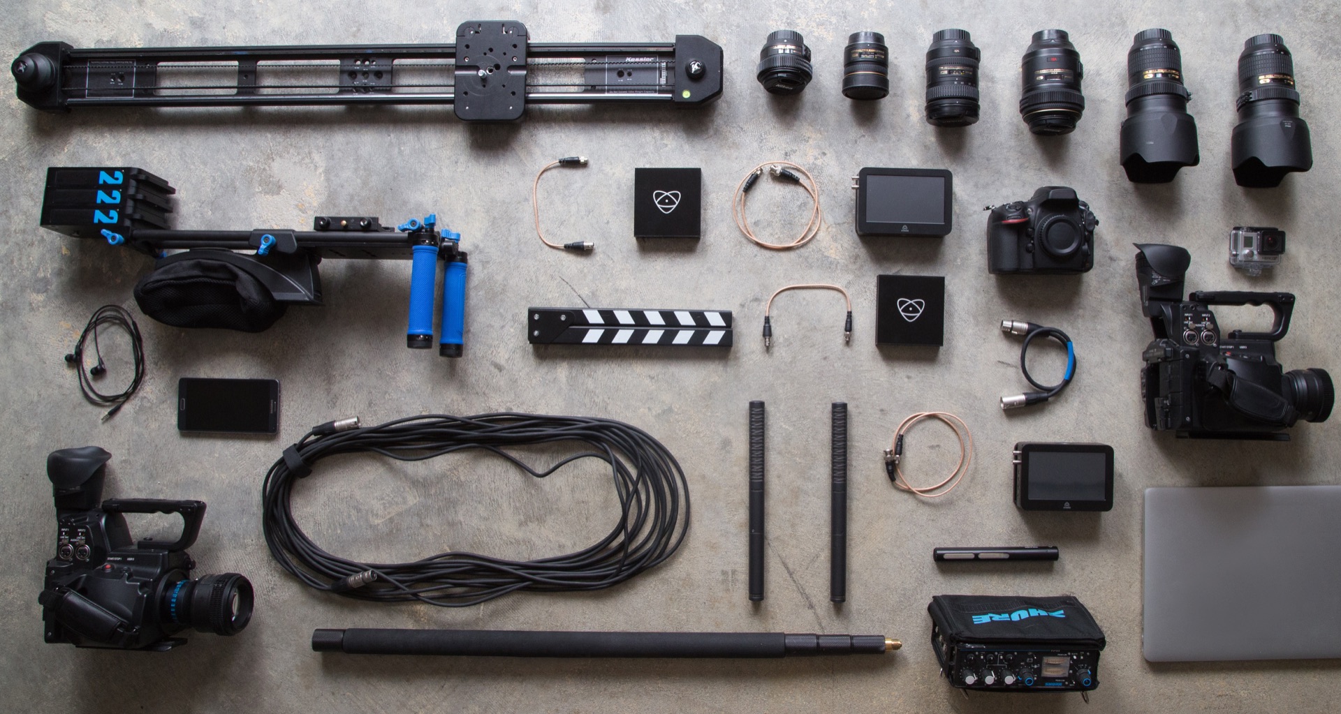 Filmmaking equipment laid out on a table