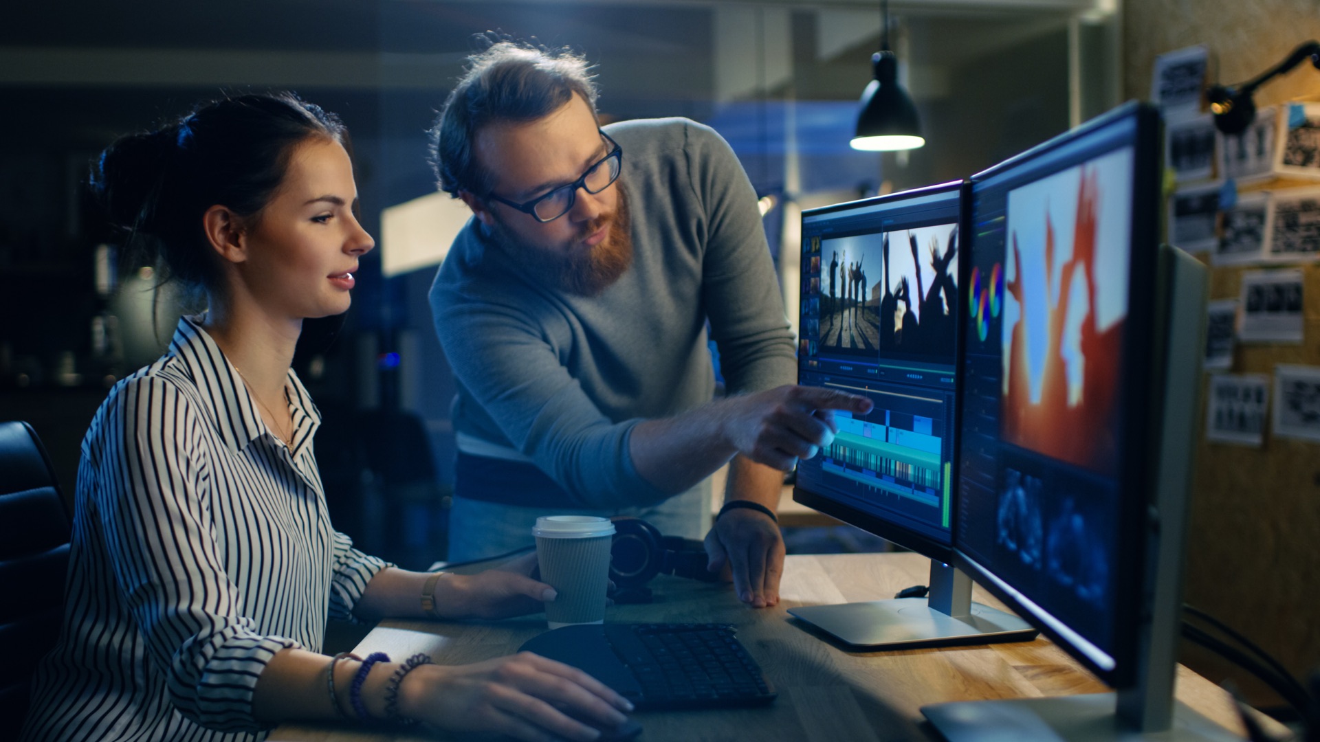 Editors working at a video editing station